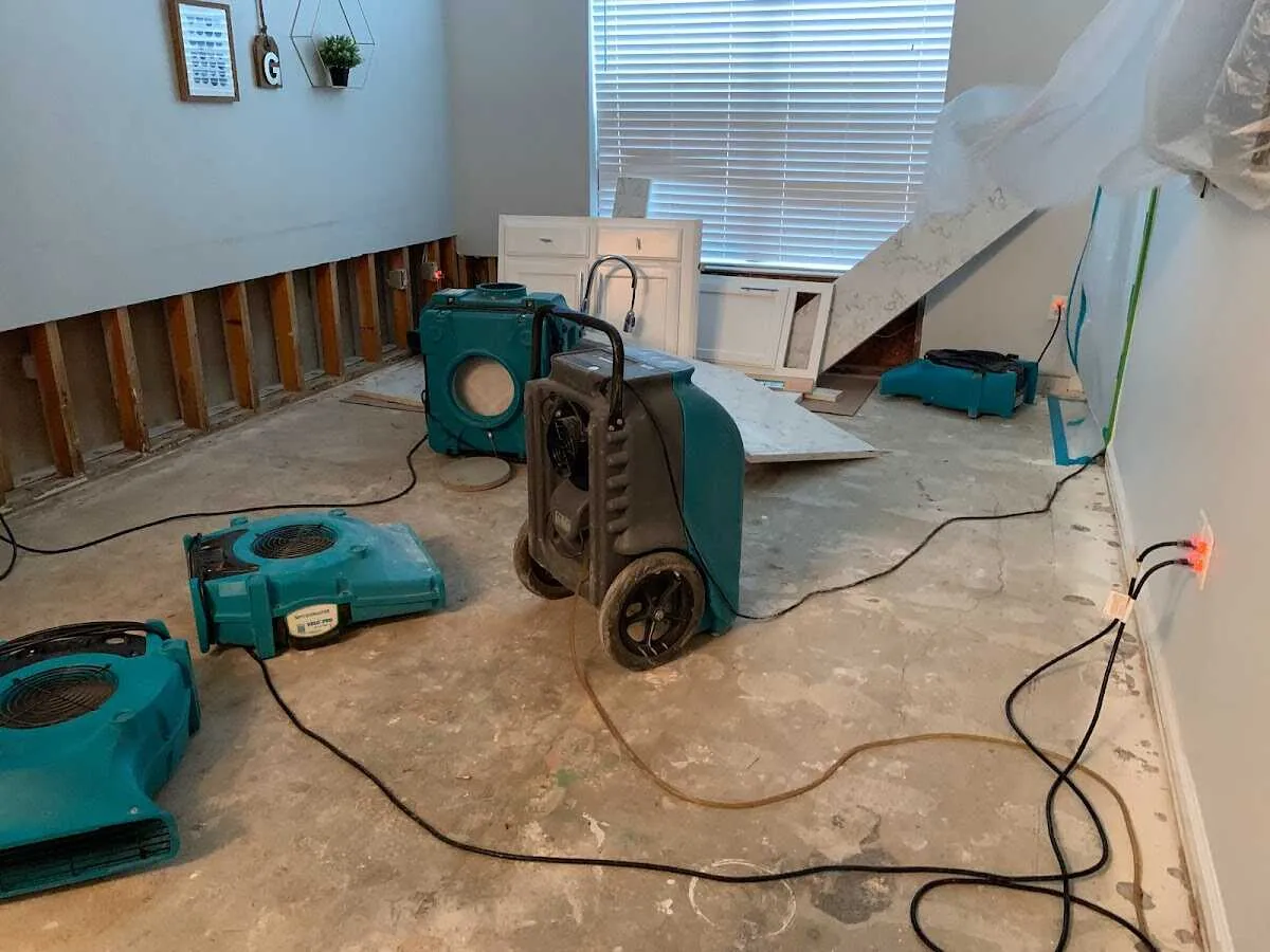 Dehumidifier in flood-cut room for Water Damage Restoration in Perry